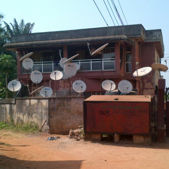 Funny Picture: House With Over 15 DSTV Dishes