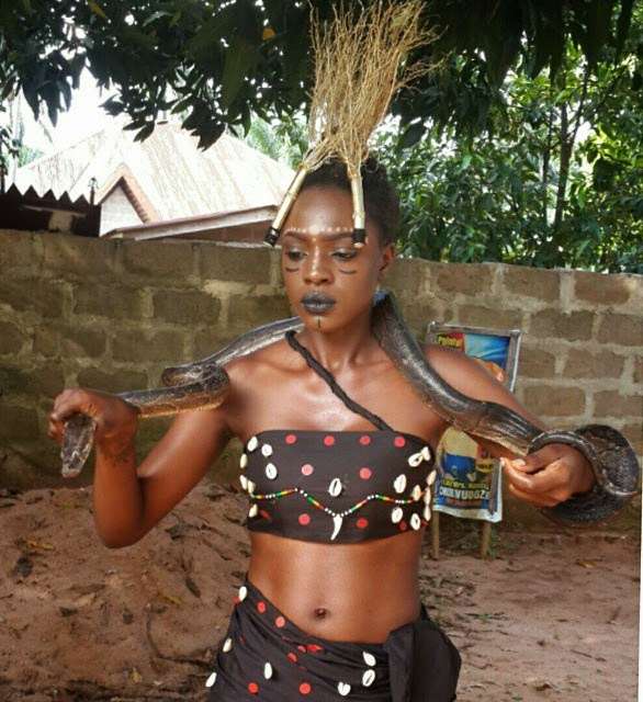 After Father’s Burial, Beverly Osu Carry’s Live Python For a Living