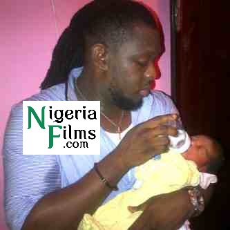 Timaya Caught Feeding New Baby