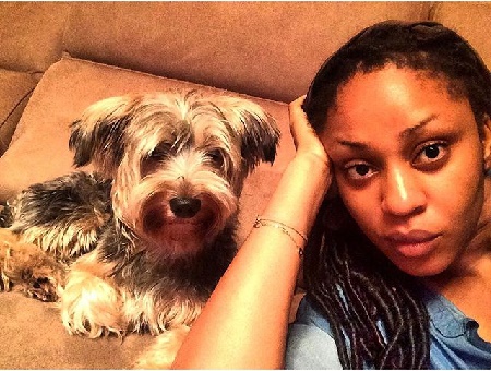 Photos: Ex-MBGN, Muna Abii Caught kissing dog Mouth to Mouth