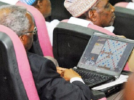 Photo: National Confab Delegate Playing Game On Laptop During Session