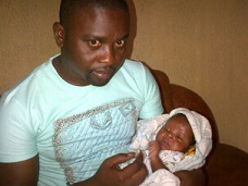 Fast-Rising Comedian, Elder O Nurses Baby After Wife’s Death