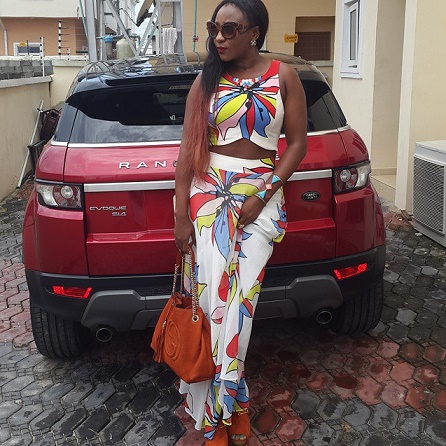 Ini Edo Flashes Abs in Colourful Outfit