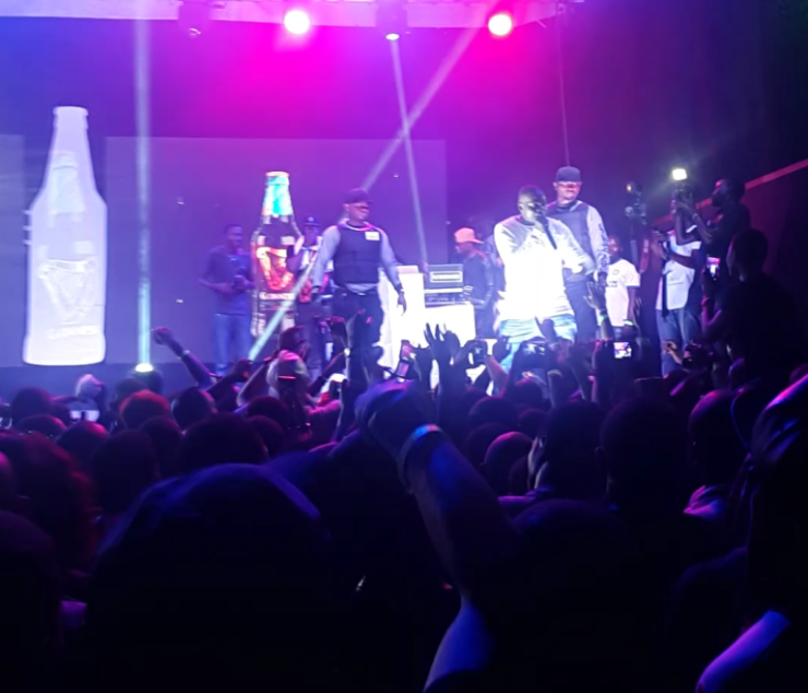 See Why Angry Fan Threw Pure water At Olamide During His Stage Performance