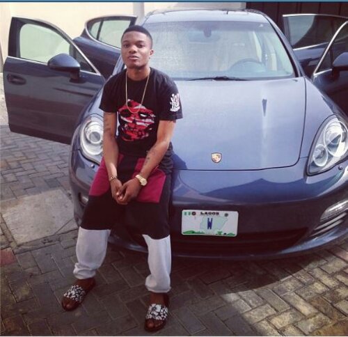 Angry Fans Reportedly Stone Wizkid, Damage His Porsche For Being Arrogant