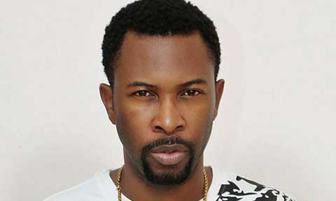 RuggedMan Shades President Buhari On Vacation While Nigeria Is On ‘Fire’